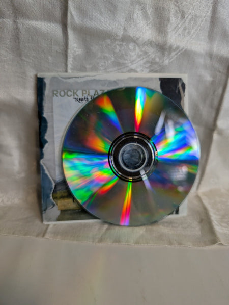 'Neath the Lion's PawRock Plaza Central2009 – USCD, *AUTOGRAPHED*