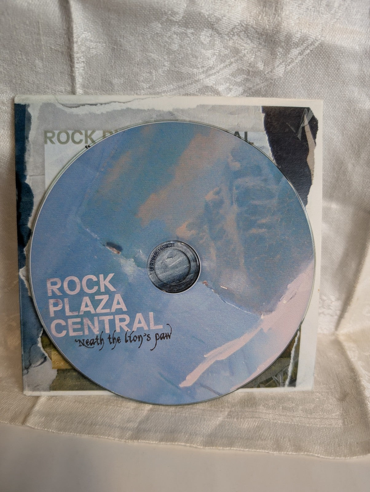 'Neath the Lion's PawRock Plaza Central2009 – USCD, *AUTOGRAPHED*