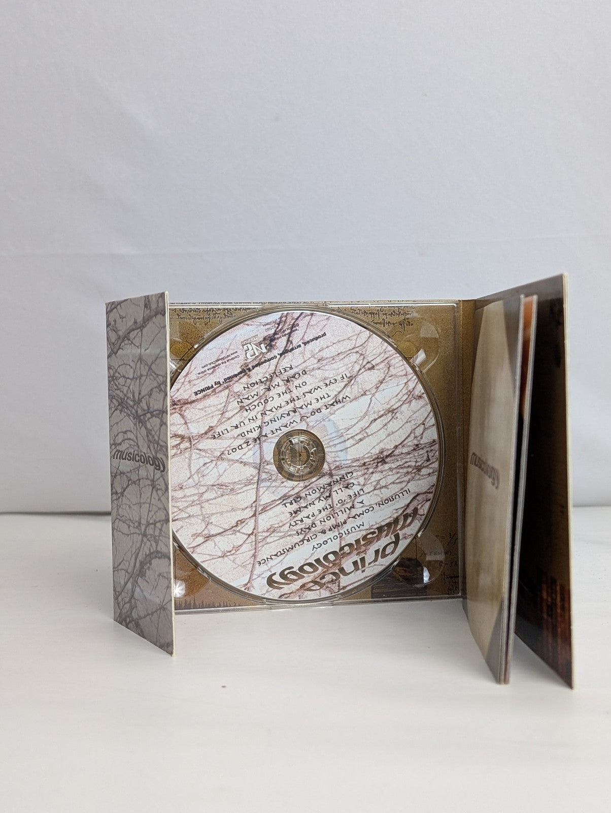 Musicology Prince2004 – Canada CD, Album, Enhanced NPG Records – CK 925601