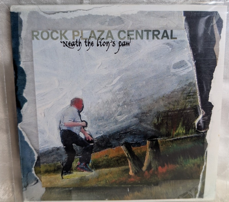Rock Plaza Central 'Neath the Lion's Paw 2009 – USCD,  AUTOGRAPHED0