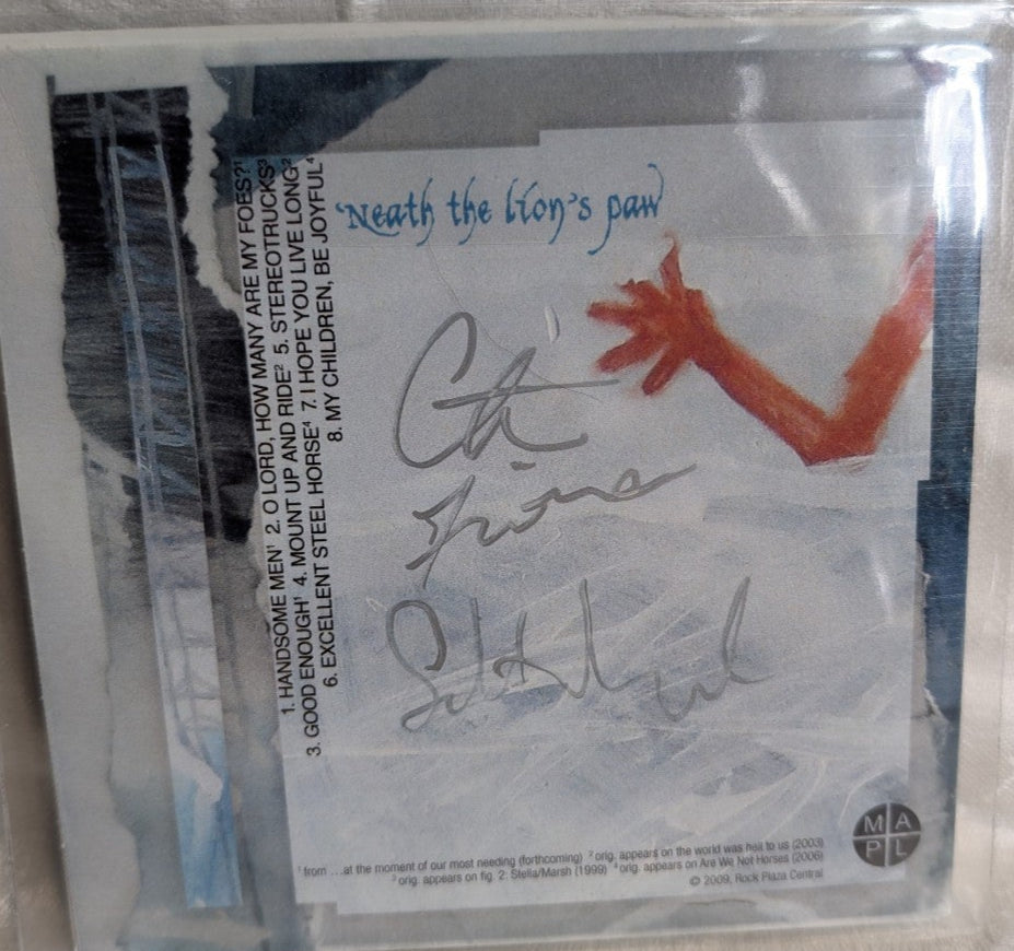 'Neath the Lion's PawRock Plaza Central2009 – USCD, *AUTOGRAPHED*